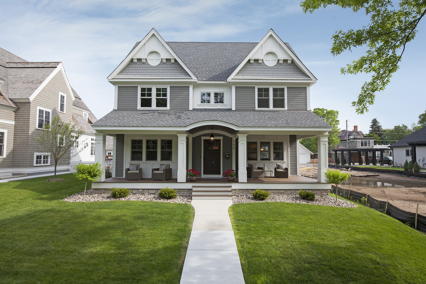 Refresh your exterior with a gray house and a white front porch