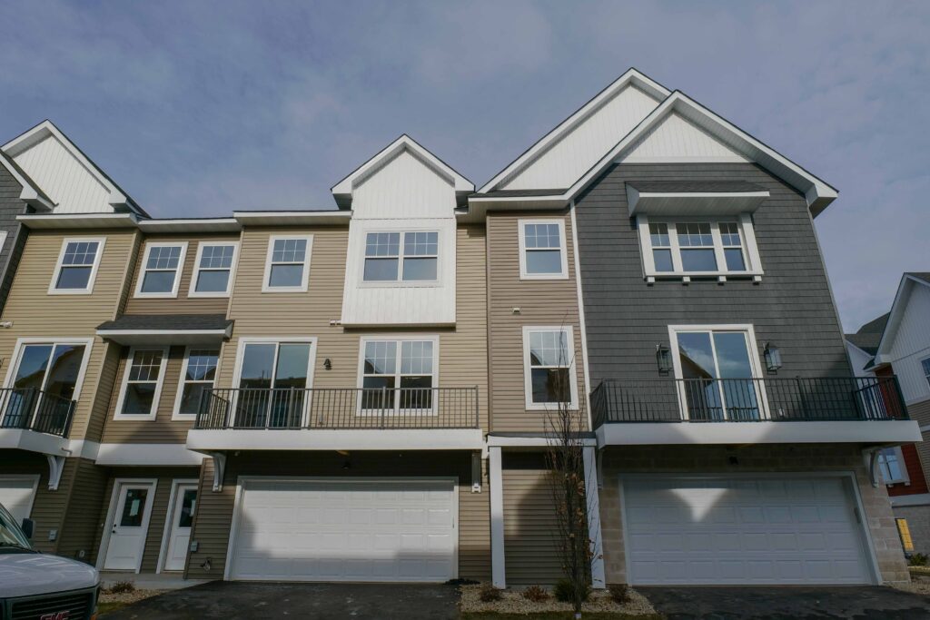 Emery Village Townhomes is an exceptional three-story residential complex boasting garages and balconies.